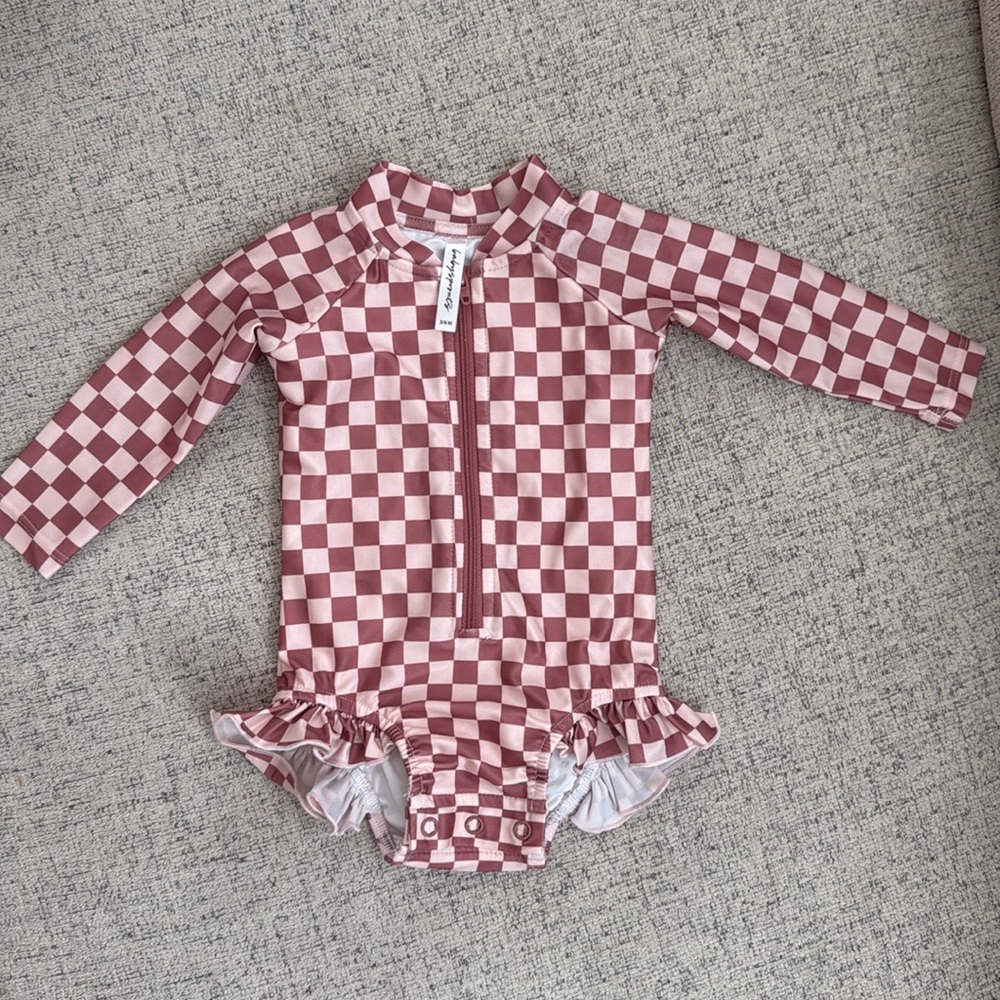 Kids Checkered Rashguard in Pink by Ruffle Butts
